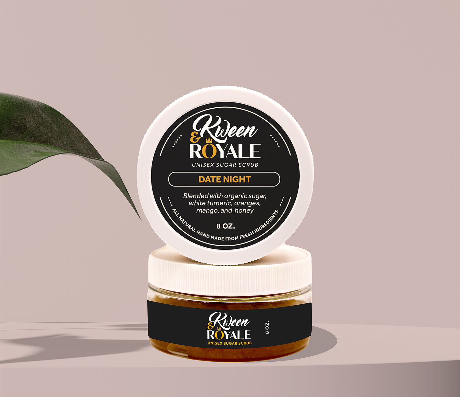 Kween Royale sugar scrub jar with lid on a neutral background